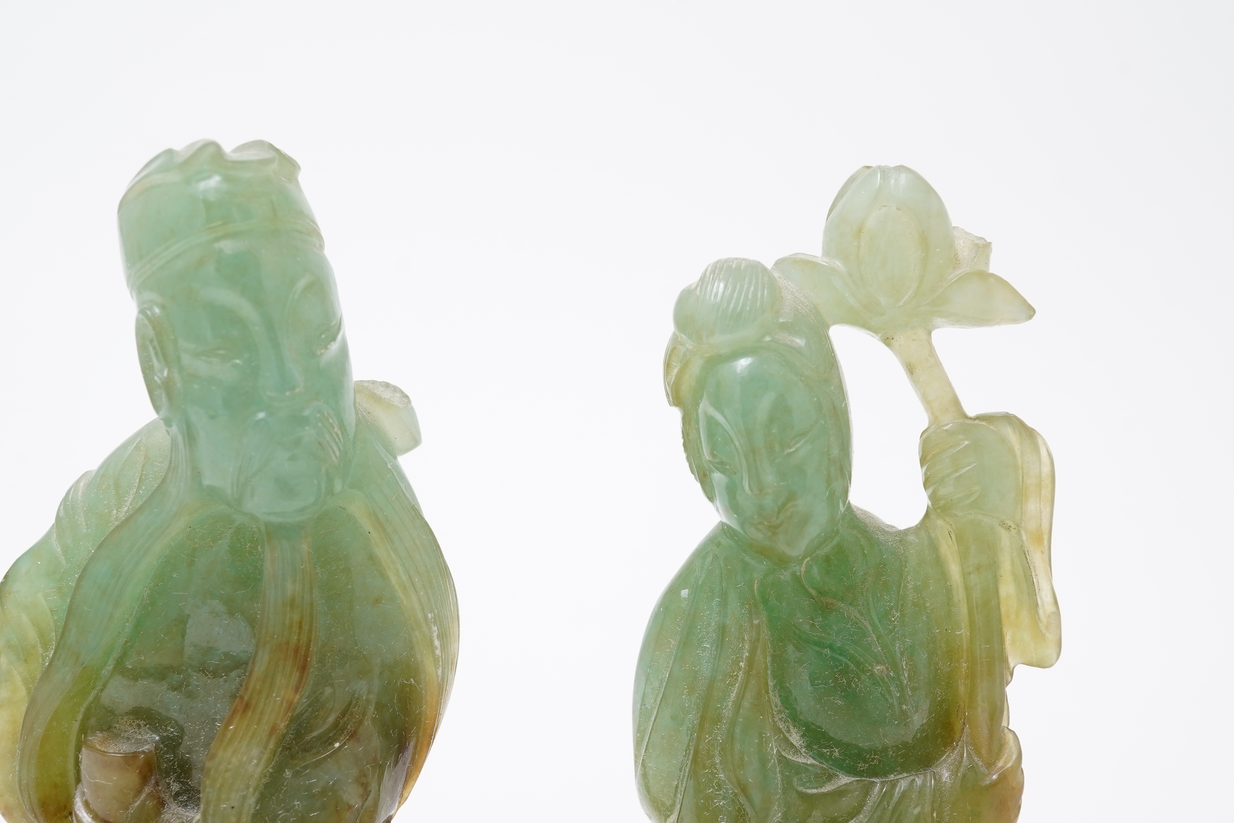 Possibly retailed by Cartier, a pair of Chinese jadeite figures, early 20th century